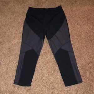 Mid calf black crop leggings.